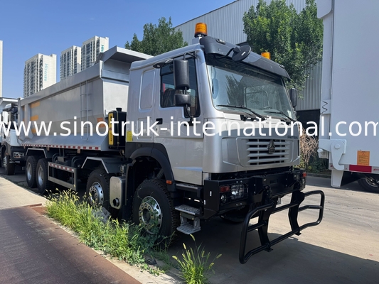 SINOTRUK HOWO 371HP 8X4 Tipper Dump Truck Constructie Oude voorzijde Militaire bumper voor mijnbouwgebieden Twee waarschuwingslichten U-type container